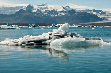 scenic view over lagoon with iceberg