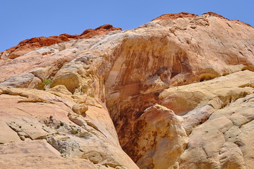 Shallow canyon walls amongst the rock outcroppings in the Nevada Desert