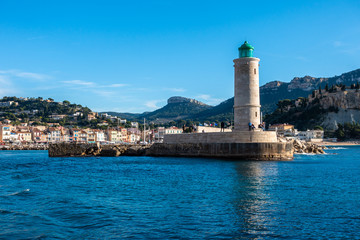 Scenic lighthouse at the entrance of Cassis harbor, France.