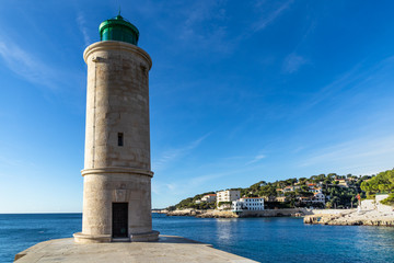 Fototapeta na wymiar Lighthouse at the entrance of Cassis port, France