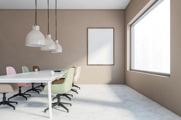 Beige meeting room with vertical mock up poster