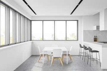 Naklejka na ściany i meble Panoramic white kitchen with bar and table