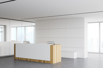 Reception desk in white office corner