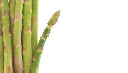 Green asparagus stem closed up isolated on white