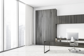 White and wooden CEO office corner