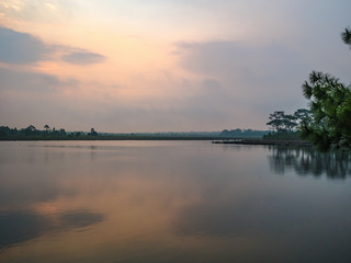 Sunrise Scenery view at reservoir on Phu Kradueng mountain national park in Loei City Thailand.Phu Kradueng mountain national park the famous Travel destination