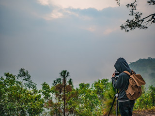 Loei/Thailand-17 Feb 2019:Unacquainted Tourist waiting for sunrise in early morning at Phu Kradueng...