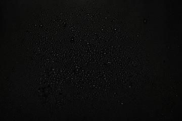 Fototapeta na wymiar water drops on black background