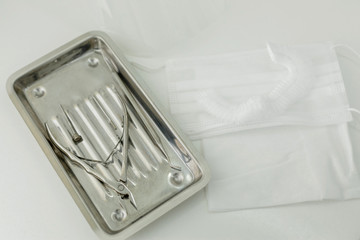 Medical instrument for pedicure, mask and surgical cap