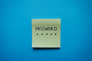 Secret password written on paper note on background. Login access, encryption and cyber security concepts.