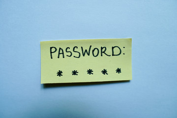Secret password written on paper note on background. Login access, encryption and cyber security...