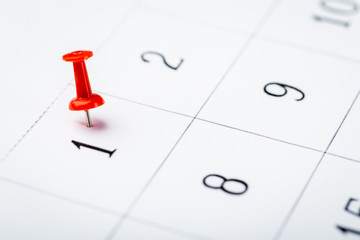 2020 calendar page marked with an important date in red pin. timeline, time, concept, idea,...