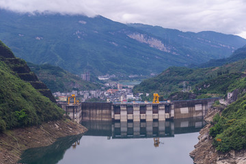 Fototapeta na wymiar Dam wall and surrounding landscape at Wulong Dam in Chongqing, China.