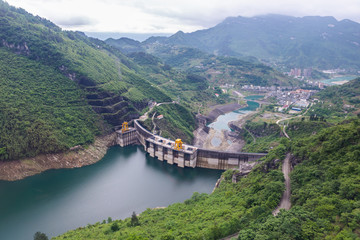 Dam wall and surrounding landscape at Wulong Dam in Chongqing, China.