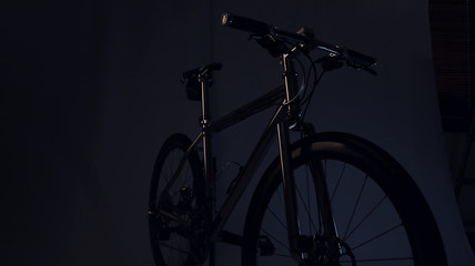 Dark silhouette shot of a bicycle
