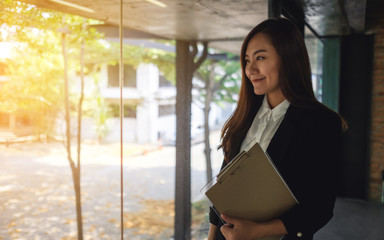 Fototapeta premium An asian successful businesswoman standing in the office