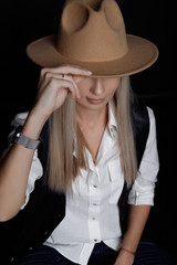 young woman in cowboy hat