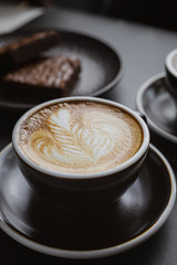 cup of coffee on a black background