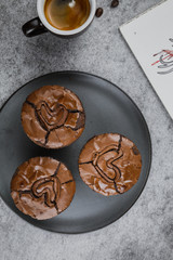 coffee and chocolate chip cookies on a plate