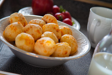 Cheese Bread served in a restaurant. 

Brazilian snack cheese bread - Traditional Brazilian food.