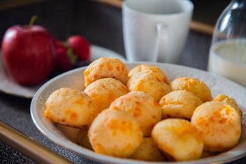Cheese Bread served in a restaurant. 

Brazilian snack cheese bread - Traditional Brazilian food.