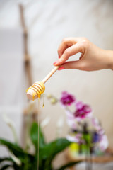 Young woman having a honey back massage