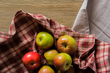 Apples wrapped in a plaid cloth