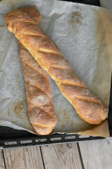 Homemade bread on a wooden backround