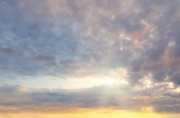 Obraz premium Blue sky clouds background. Beautiful landscape with clouds and orange sun on sky