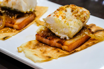 cod top with marinated pork belly