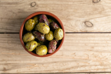 olives in a wooden background 