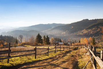 Mountain rural landscape with footpath in the autumn on a sunny day.
