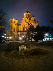 Exterior of the Saint Mark's Church (Crkva Svetog Marka), a Serbian Orthodox church located in the Tasmajdan park, built in 1940 in the Serbo-Byzantine style, at night. - obrazy, fototapety, plakaty