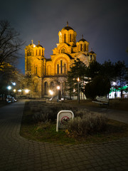 Fototapeta Exterior of the Saint Mark's Church (Crkva Svetog Marka), a Serbian Orthodox church located in the Tasmajdan park, built in 1940 in the Serbo-Byzantine style, at night. obraz