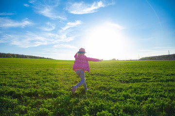 child running in field