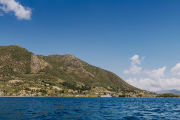 Greek Island viewed from the sea. Beautiful sea landscapes on Island in Greece. In distance is famous Scorpios island, from the left side is Lefkada island and from right is a part of gorgeous