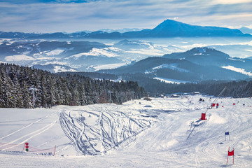 Beautiful scenery of the snowy winter landscape. View from the ski slope of the Kubinska hola resort in Slovakia, Europe. © Viliam