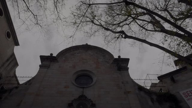 Dark Church Surrounded of Black Trees on a Cloudy Day, Like a Horror Movie, 4K