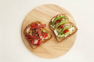 Two bruschettes with meat on the Board