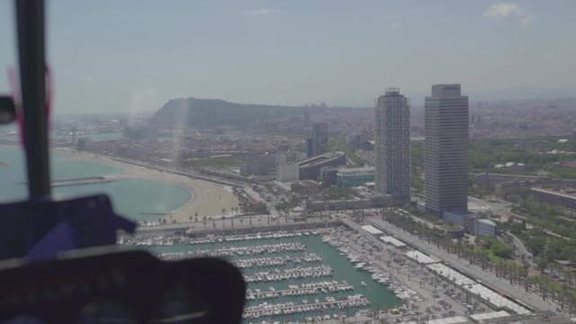 Helicopter Inside View of Barcelona's Skyline in a Sunny Day, HD