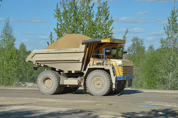 
mining truck carries a full body of sand