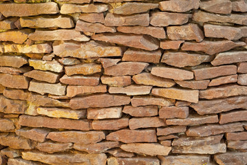 Old brick wall. Masonry of red brick closeup.
