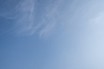 Sky background with tiny cloud.