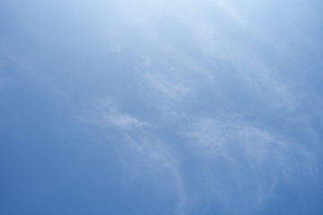 Sky background with tiny cloud.