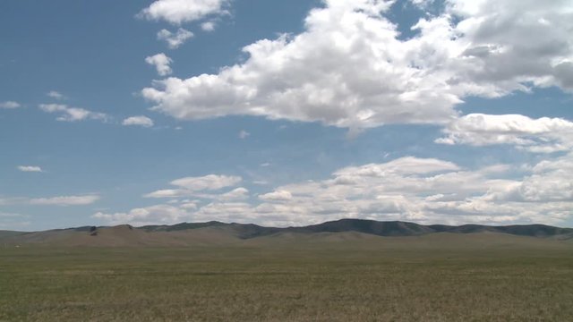 Mongolian landscapes and heatlands with wild horses and shamanic sanctuaries.