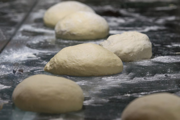 Fototapeta na wymiar Close up of dough for bread ready to be baked. 