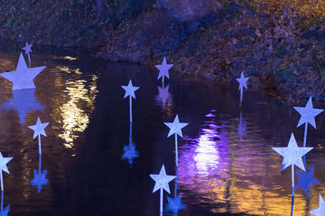 Pond with stars at Christmas.
