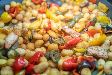 Traditional czech food in a street market. Fried potatoes with vegetables