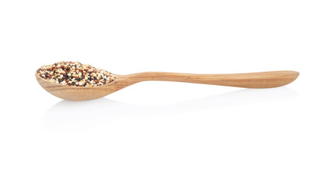 Quinoa in wooden spoon isolated on white background, health care concept