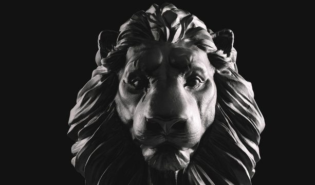Lion statue, a stone sculpture. Concept of a guard, power and proud animal.